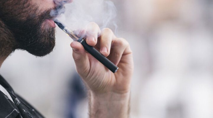 man vaping