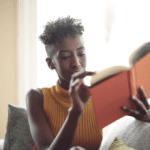 A woman reading a book.