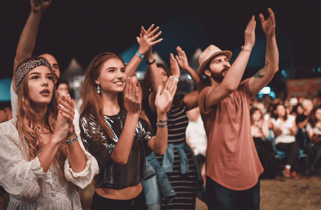 Young people at a summer concert.