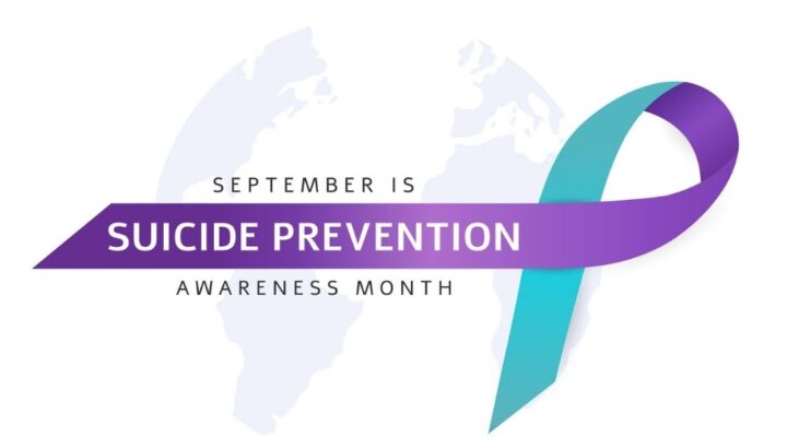 Purple and teal ribbon with text reading ‘September is Suicide Prevention Awareness Month.’
